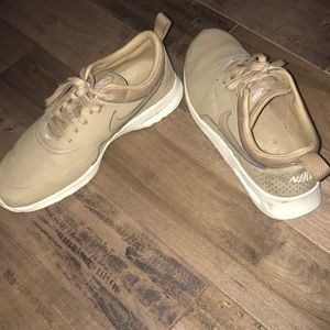 Gold Nike sneakers